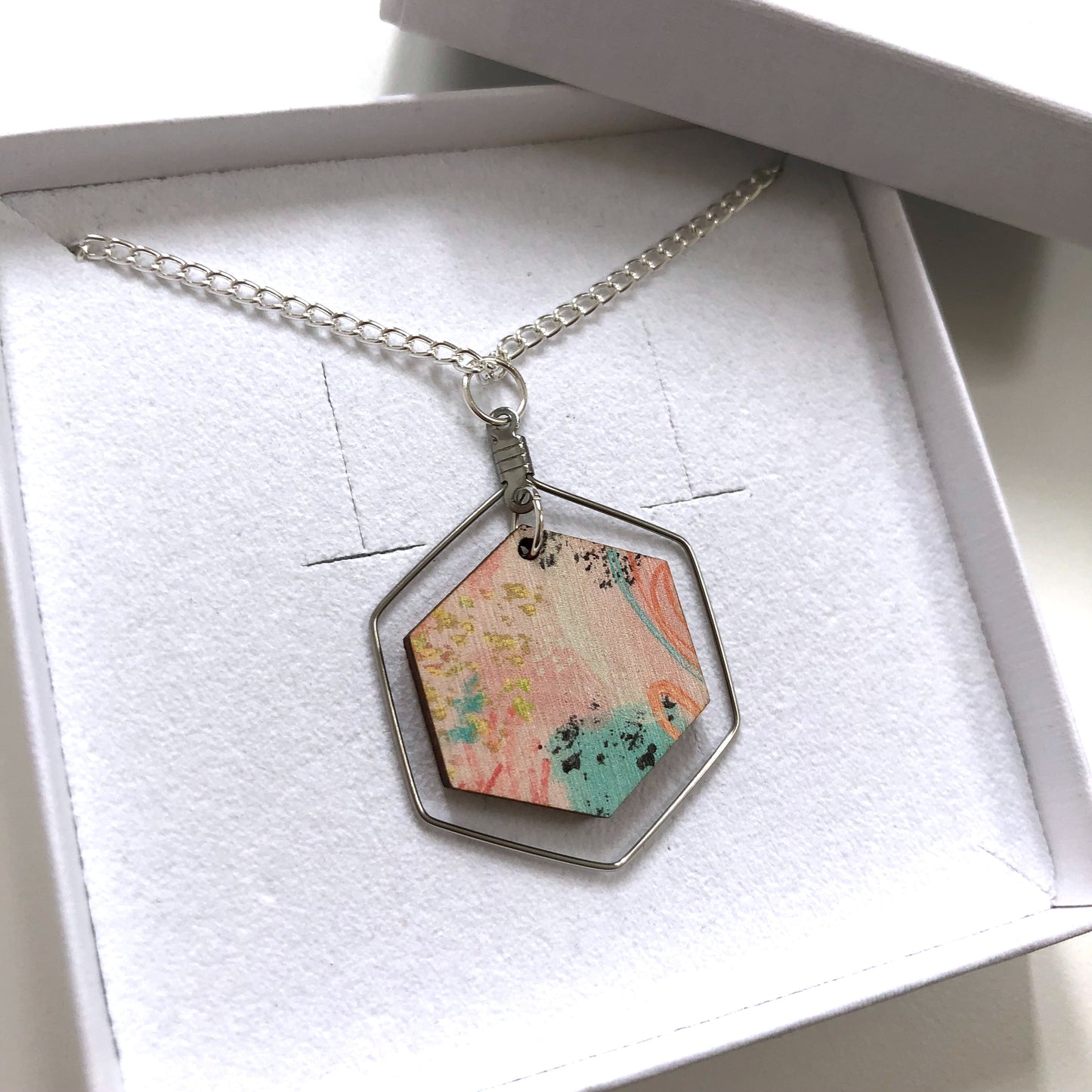 Abstract hexagon statement necklace in pink